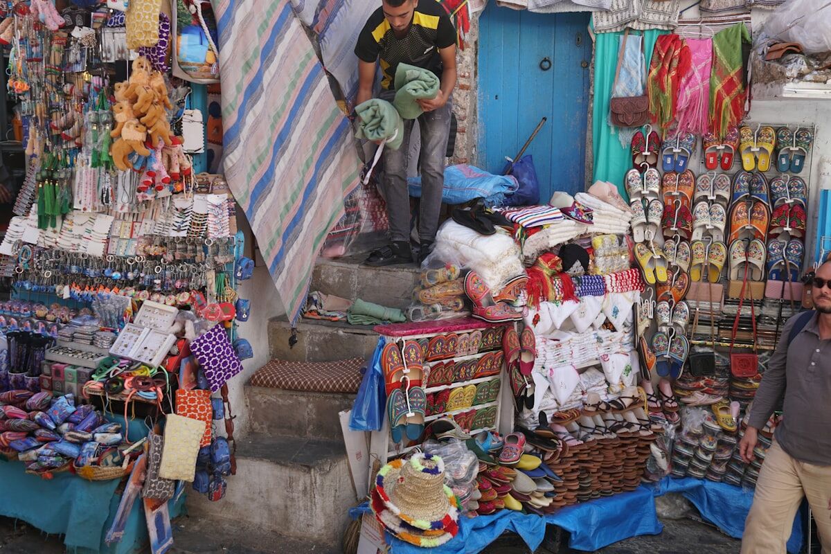 A small market stall with colourful goods on display