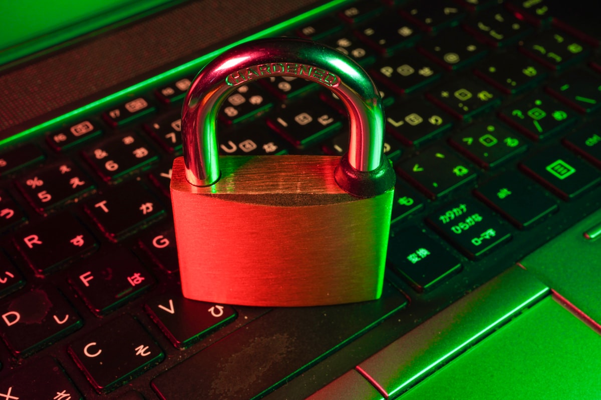 A padlock resting on a computer keyboard